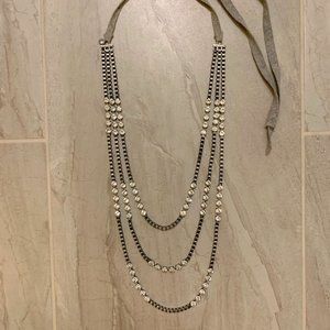 Layered crystal necklace, tie close